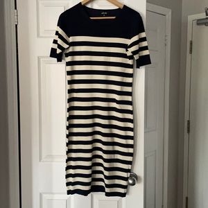 Like new cream and navy blue stripped dress.